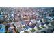 An aerial view shows a close-knit community with charming homes and neatly maintained yards at 2432 N Talbott St, Indianapolis, IN 46205