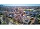 A vibrant neighborhood with colorful houses and tree-lined streets is captured from an aerial perspective at 2432 N Talbott St, Indianapolis, IN 46205