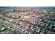 A vibrant community aerial view with a mix of residential and commercial properties and streets at 2432 N Talbott St, Indianapolis, IN 46205