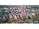 Neighborhood aerial view, showcasing a variety of well-maintained homes with a tree-filled environment and city backdrop at 2432 N Talbott St, Indianapolis, IN 46205