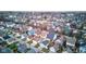 A neighborhood with colorful houses and tree-lined streets creates a sense of community and charm at 2432 N Talbott St, Indianapolis, IN 46205