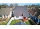 A backyard with a manicured lawn, privacy fence, and a charming porch for outdoor relaxation at 2432 N Talbott St, Indianapolis, IN 46205