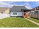 Attractive home featuring a fenced yard with a patio and a covered porch for outdoor gatherings at 2432 N Talbott St, Indianapolis, IN 46205