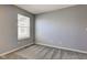 View of a bedroom featuring neutral carpet and a window at 2432 N Talbott St, Indianapolis, IN 46205
