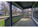 Spacious covered front porch, perfect for enjoying the outdoors with neighborhood views at 2432 N Talbott St, Indianapolis, IN 46205