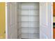 Walk-in pantry featuring shelving and storage space, great for organizing all your non-perishable food at 2432 N Talbott St, Indianapolis, IN 46205