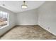 Bright bedroom with a vaulted ceiling and a light fixture at 307 Beacon Point Ln, Fortville, IN 46040