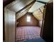 Attic space with finished plywood and vaulted ceiling at 3120 Central Ave, Anderson, IN 46016