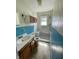 Bathroom area featuring tile flooring, modern sink vanity and step in shower at 3120 Central Ave, Anderson, IN 46016