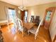 Bright dining room featuring hard wood floors and built in glass display cabinet at 34 W Main St, Brownsburg, IN 46112