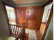 Second floor hallway featuring built-in storage, wood floors, and neutral colored walls at 34 W Main St, Brownsburg, IN 46112