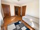 Cozy living room with hardwood floors, neutral-colored walls, and natural light at 34 W Main St, Brownsburg, IN 46112