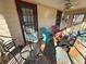 Inviting porch with colorful Adirondack chairs, perfect for relaxing outdoors at 34 W Main St, Brownsburg, IN 46112