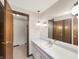 Bathroom featuring a vanity with sink, lighting, and a mirror at 3509 River Bluff Rd, Anderson, IN 46012