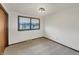 Bedroom with window, neutral carpet, and natural light at 3509 River Bluff Rd, Anderson, IN 46012