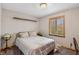 Neutral bedroom with a globe, comfortable bed, and natural light at 3602 N County Road 950 E, Brownsburg, IN 46112
