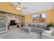 Bright living room featuring large windows, a sectional sofa, and sliding doors to the home's interior at 3602 N County Road 950 E, Brownsburg, IN 46112
