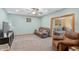 Cozy living area showcases comfortable seating, neutral tones, and an open doorway to another relaxing space at 3602 N County Road 950 E, Brownsburg, IN 46112