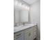 Modern bathroom vanity features granite countertop and updated fixtures at 3705 River Rd, Columbus, IN 47203