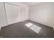 Bright bedroom with carpet, closet, and natural light at 3936 Par Dr, Indianapolis, IN 46268