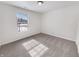 Bedroom with neutral carpet, natural light, and a ceiling light at 3936 Par Dr, Indianapolis, IN 46268