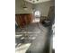 Unfurnished interior with brick details and hanging light fixtures, offering renovation potential at 408 E Monroe St, Alexandria, IN 46001
