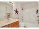 Bathroom featuring a vanity with sink, a toilet, and a tub with a shower at 4925 Opal Ridge Ln # 309, Indianapolis, IN 46237