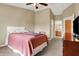 Cozy bedroom featuring neutral tones, a queen bed, and an en-suite bathroom at 4925 Opal Ridge Ln # 309, Indianapolis, IN 46237