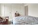 Bedroom with bed, chair, and doorways at 4925 Opal Ridge Ln # 309, Indianapolis, IN 46237