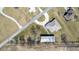 Stunning aerial view of the property showcasing the home, large outbuilding, and surrounding land at 5529 W Mccord Rd, McCordsville, IN 46055