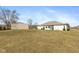 Spacious backyard featuring a view of the rear of the house and a storage shed at 5529 W Mccord Rd, McCordsville, IN 46055