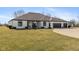 Gorgeous ranch-style home with manicured lawn and three car garage at 5529 W Mccord Rd, McCordsville, IN 46055