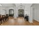 Bright foyer features high ceilings, wood-look floors, and a decorative glass front door at 5529 W Mccord Rd, McCordsville, IN 46055