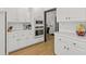 Bright kitchen featuring all white appliances, cabinets, and countertops at 5529 W Mccord Rd, McCordsville, IN 46055