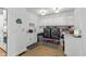 Bright laundry room with white cabinets, countertops, modern washer and dryer, and stylish décor at 5529 W Mccord Rd, McCordsville, IN 46055