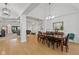 Spacious living room features vaulted ceilings, wood-look floors, and natural light at 5529 W Mccord Rd, McCordsville, IN 46055