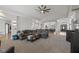 Open concept living room features high ceilings, neutral decor, and archways at 5529 W Mccord Rd, McCordsville, IN 46055
