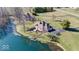 Beautiful home on a large lot with a pond, mature trees, and a long driveway at 563 E Greencastle Rd, Mooresville, IN 46158