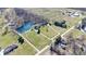Lush acreage with multiple homes, ponds, and mature trees offering a serene, secluded setting at 563 E Greencastle Rd, Mooresville, IN 46158