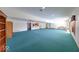 Large finished basement featuring carpeting, recessed lighting, and a built-in bar area for entertaining at 563 E Greencastle Rd, Mooresville, IN 46158