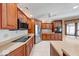 Well-equipped kitchen with stainless steel appliances, and wood cabinets, for modern convenience at 563 E Greencastle Rd, Mooresville, IN 46158