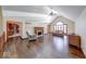 Inviting living room with a fireplace, hardwood floors, vaulted ceilings, and an abundance of natural light at 563 E Greencastle Rd, Mooresville, IN 46158