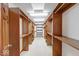 Large walk-in closet with custom wood shelving and ample storage space for shoes and clothing at 563 E Greencastle Rd, Mooresville, IN 46158