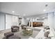 Finished basement with a stylish bar area, comfortable seating, and modern lighting at 5884 Kingsley Dr, Indianapolis, IN 46220