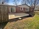 Backyard with patio, grass and landscape bordering backyard at 6512 Buttonwood Dr, Noblesville, IN 46062