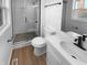Modern bathroom featuring a glass shower, white vanity, and stylish fixtures at 6512 Buttonwood Dr, Noblesville, IN 46062