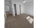 Spacious bedroom features closet with sliding doors and neutral carpet at 6512 Buttonwood Dr, Noblesville, IN 46062