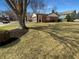 View of house with front lawn and tree at 6512 Buttonwood Dr, Noblesville, IN 46062