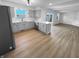 Modern kitchen featuring new cabinetry, countertops, stainless steel appliances, and breakfast bar at 6512 Buttonwood Dr, Noblesville, IN 46062