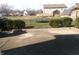 Fenced backyard with a trampoline, lawn, and various plantings at 6812 Cadwell Cir, Indianapolis, IN 46237
